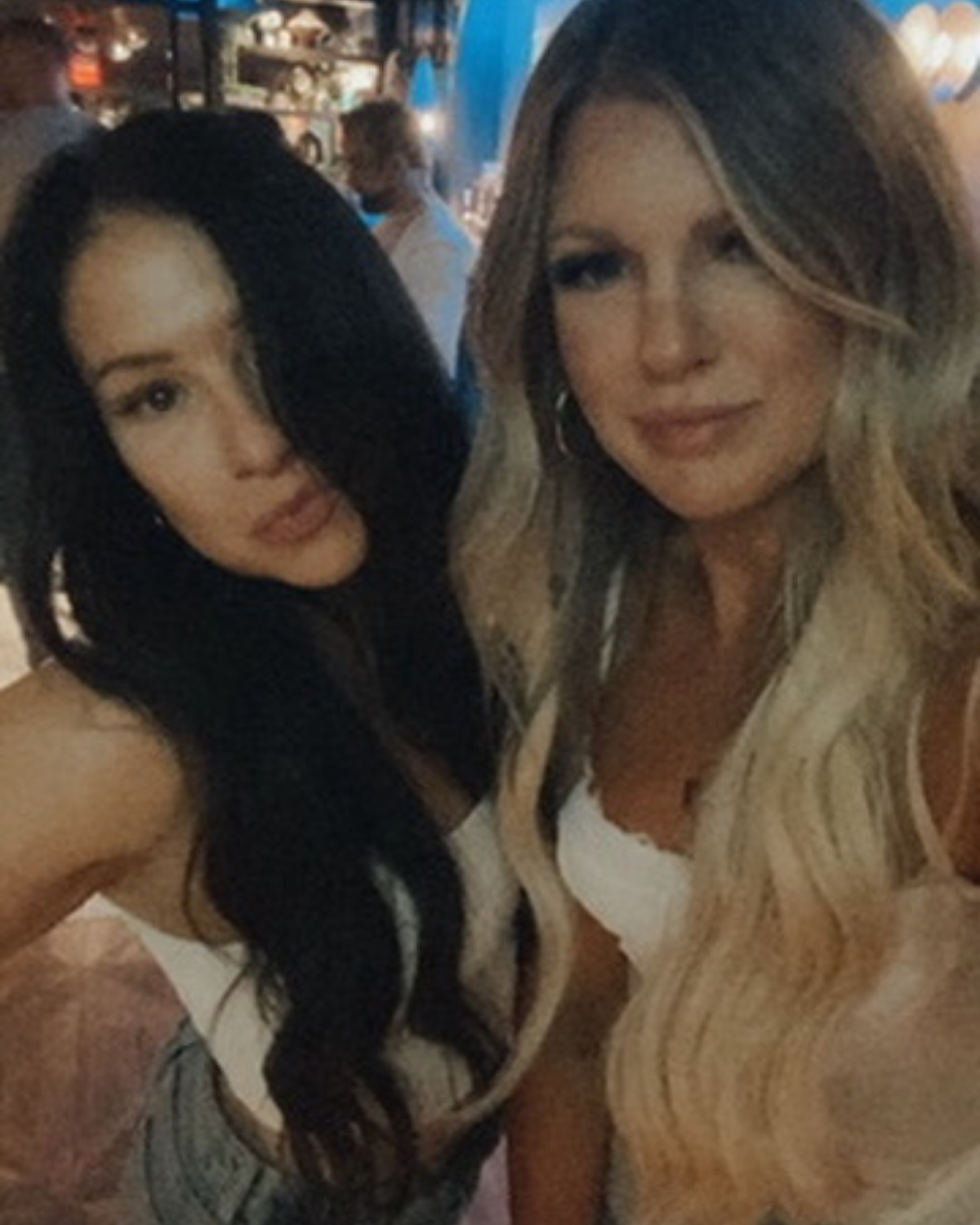 The KYELLA founders posing together at night