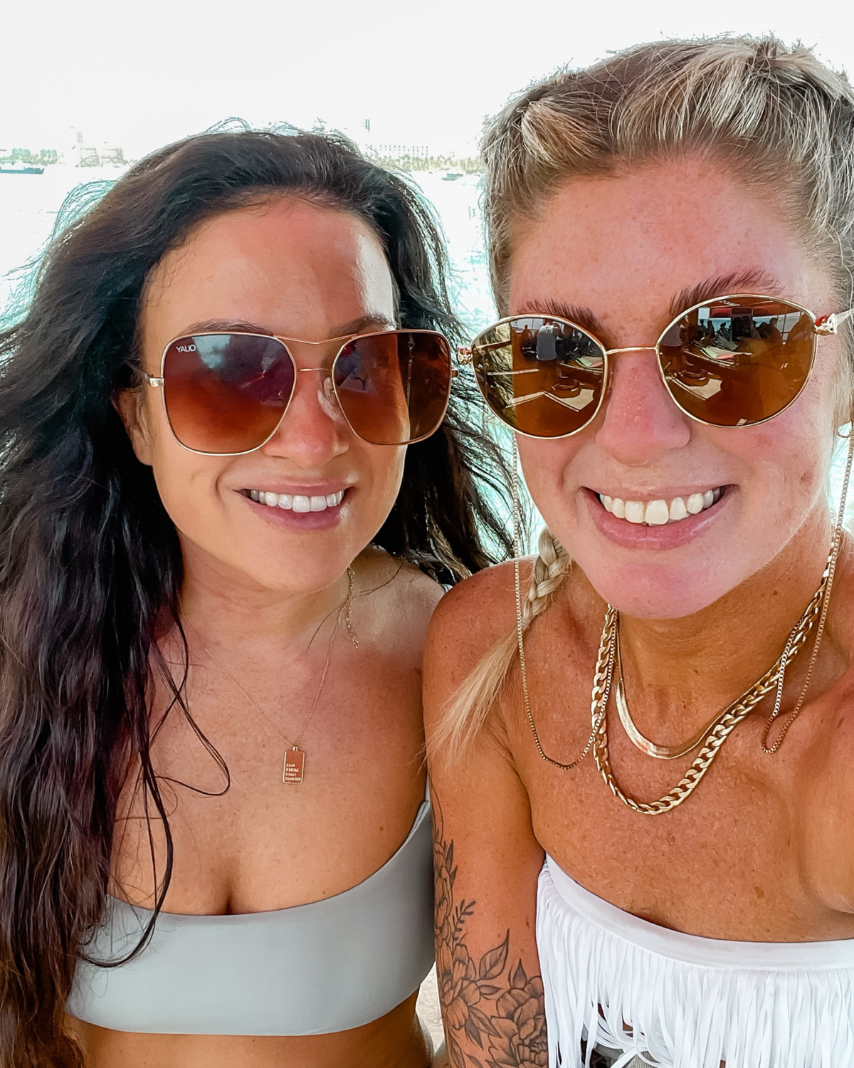 The KYELLA founders smiling together outdoors