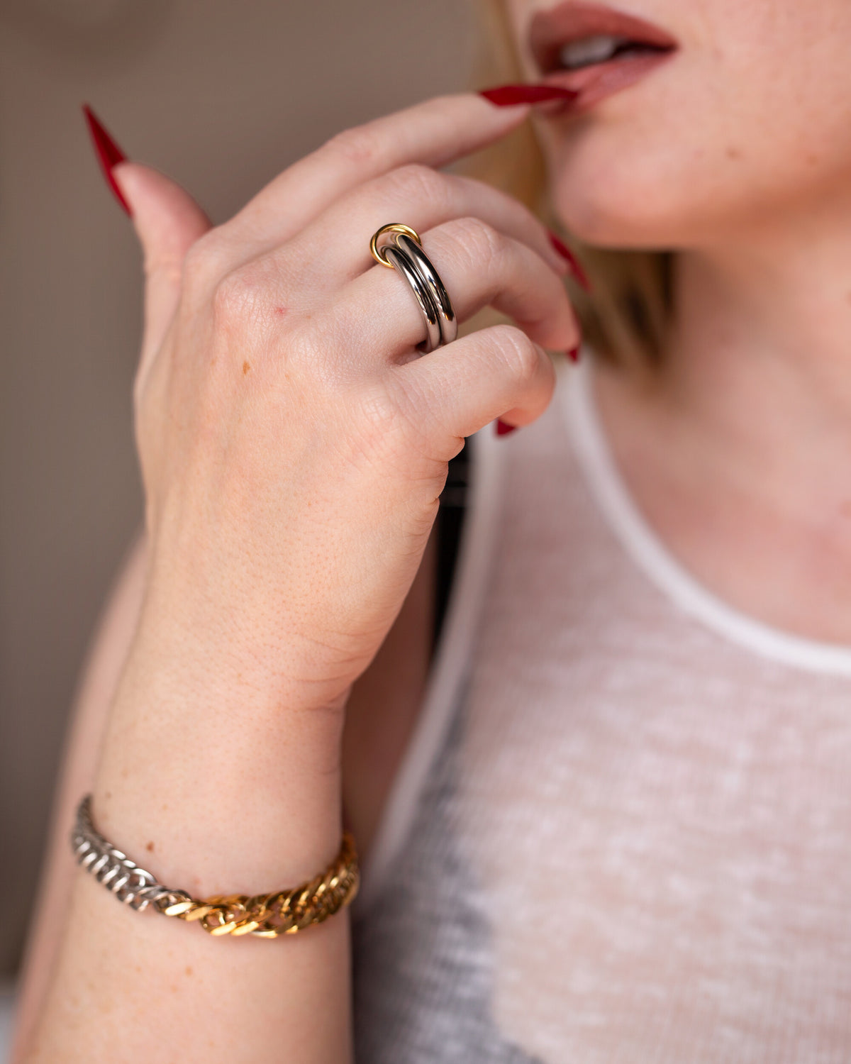 Ara Bracelet, a mixed-metal 18K Gold PVD clasp bracelet.