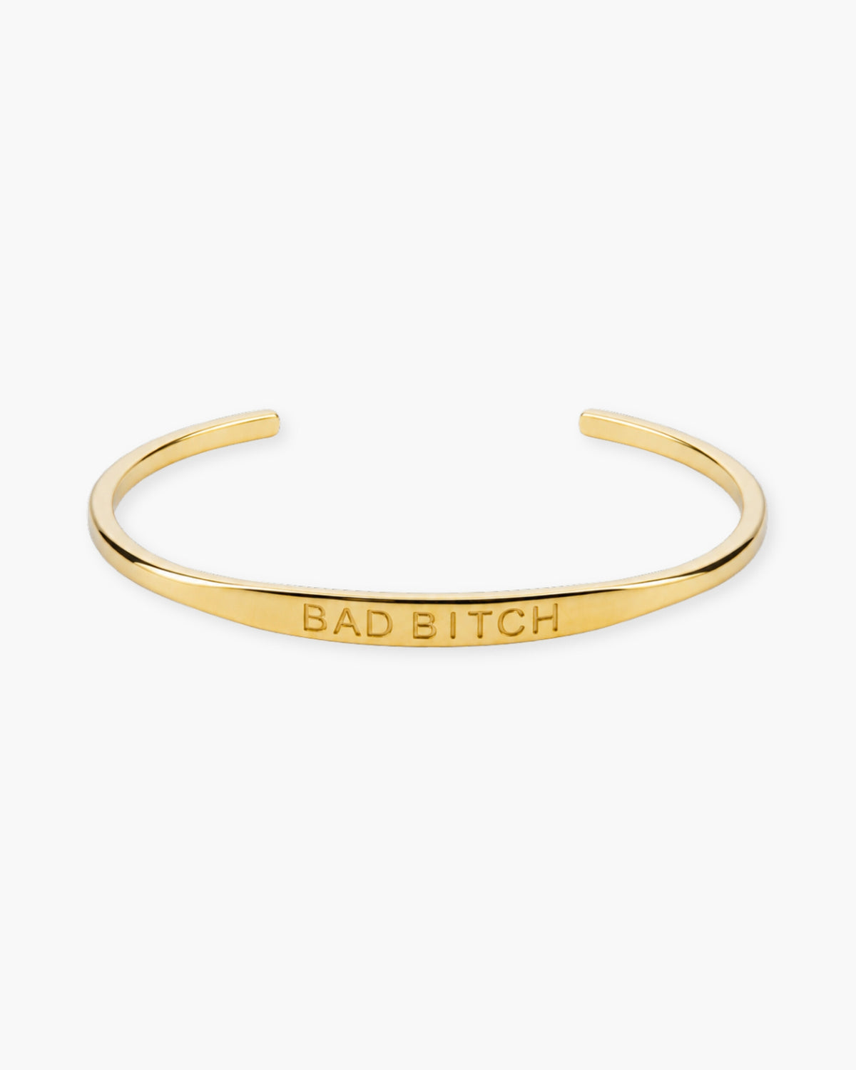 Gold open cuff bracelet engraved with BAD BITCH on a white background.