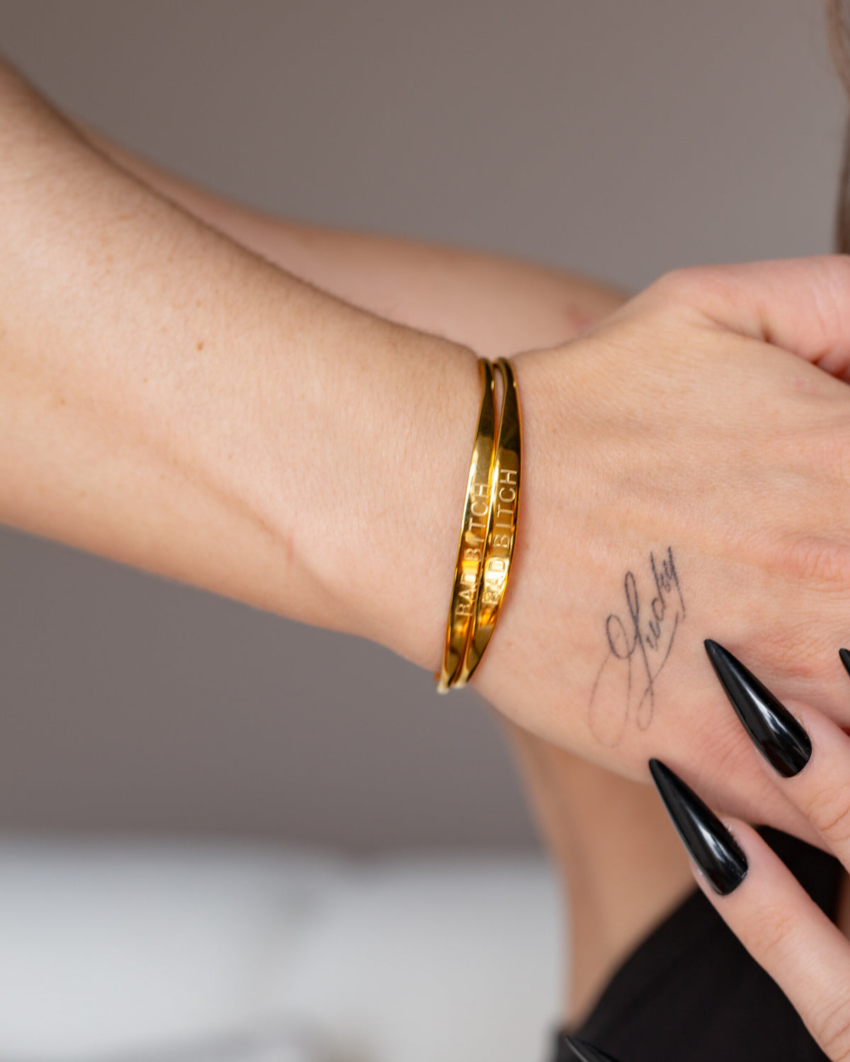 Bad Bitch Cuff shown in an additional styled detail view.
