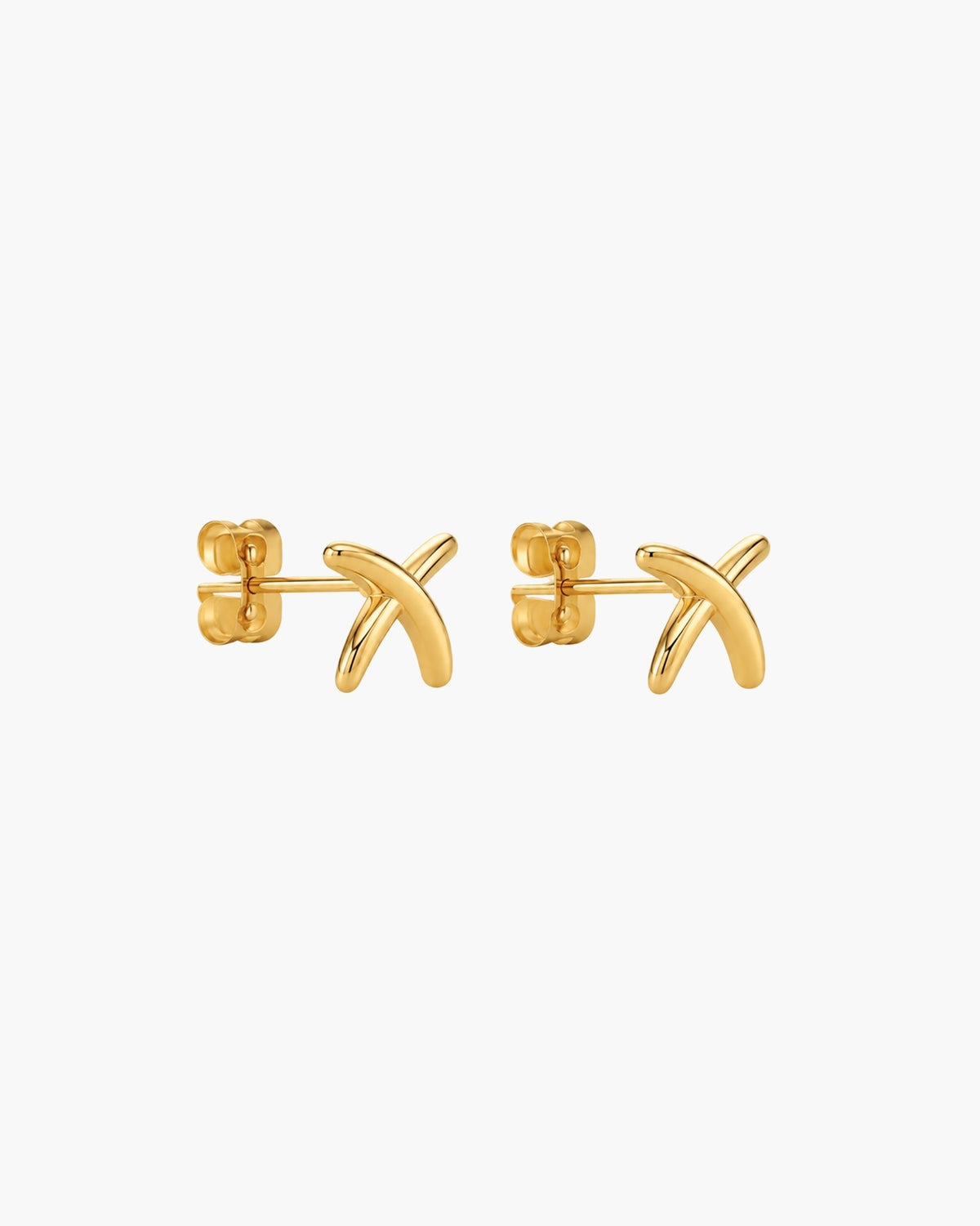 Pair of polished gold-tone crossed stake stud earrings.