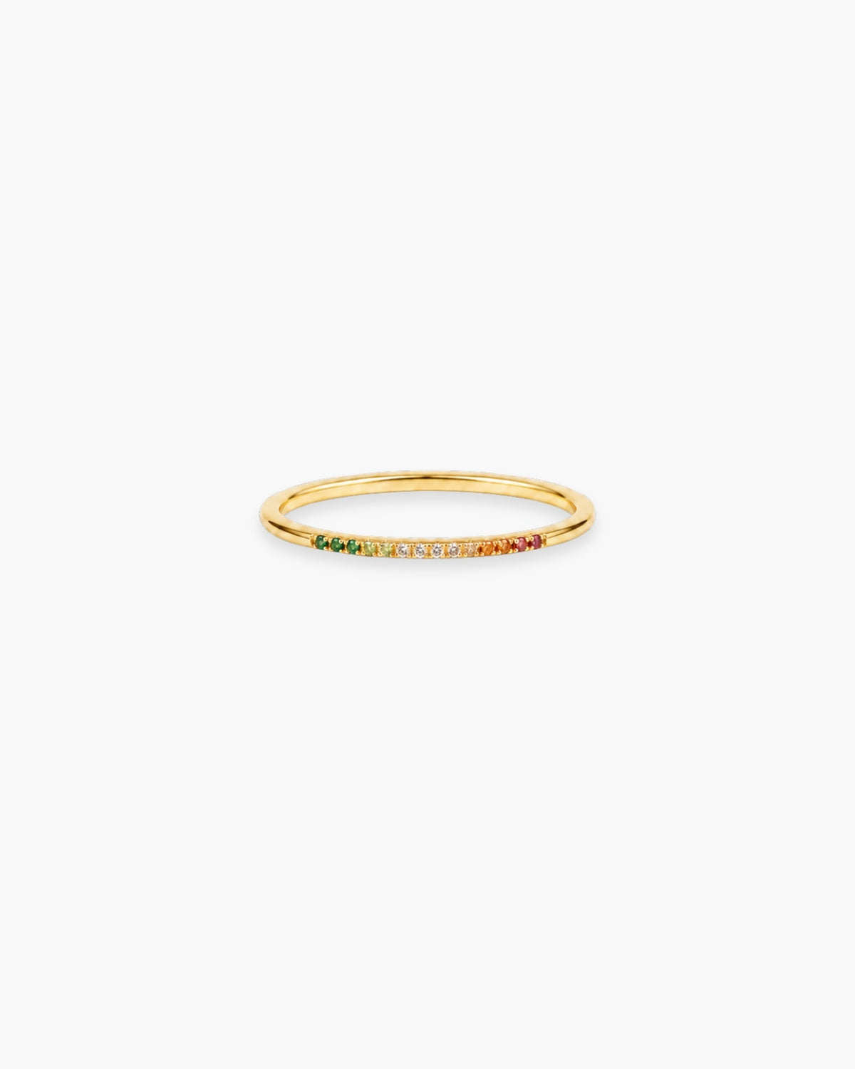 Slim gold-tone Iris stacking ring with a row of small multicolor pavé-style stones on a white background.