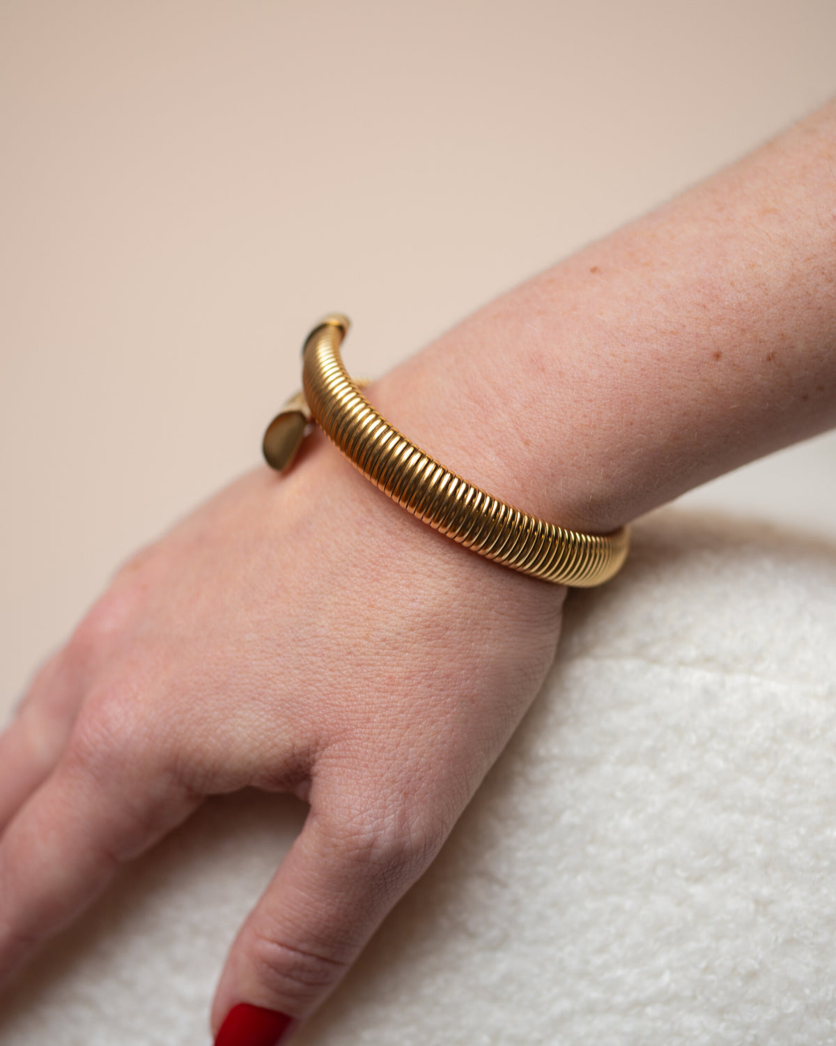 Joye Cuff worn on the wrist, hover view.