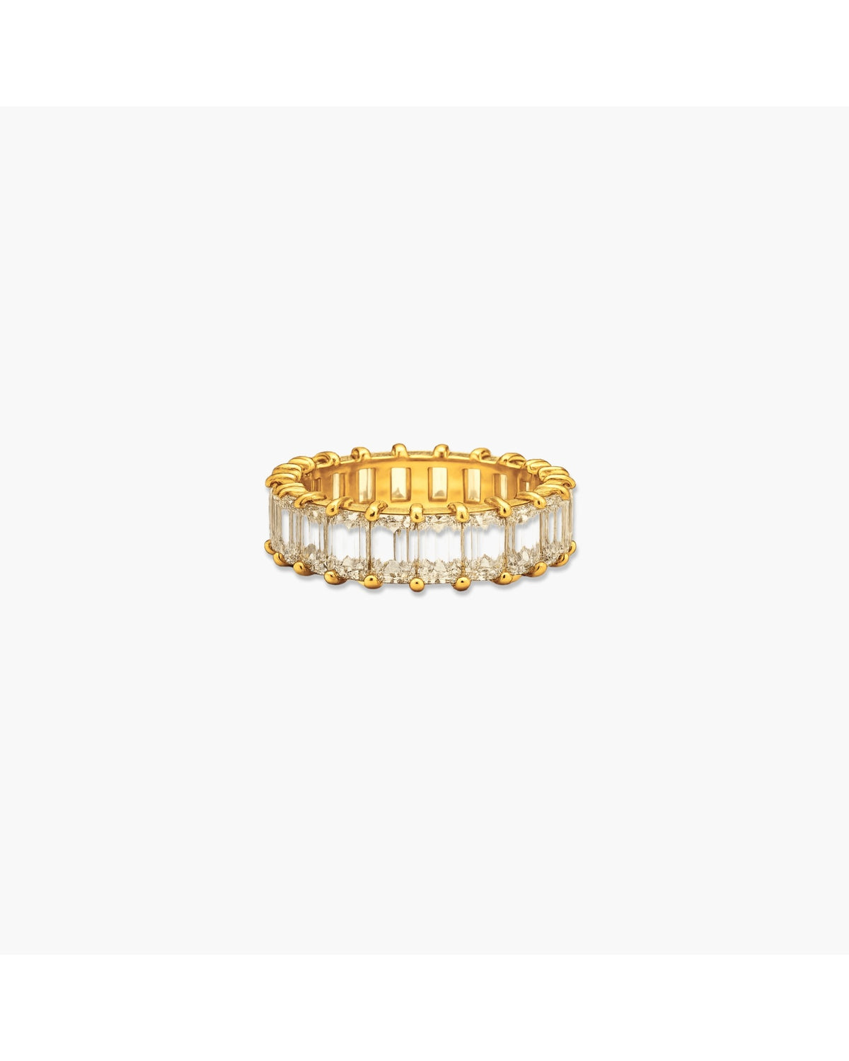 Gold-tone Liza eternity band with a continuous row of clear rectangular emerald-cut stones on a white background.