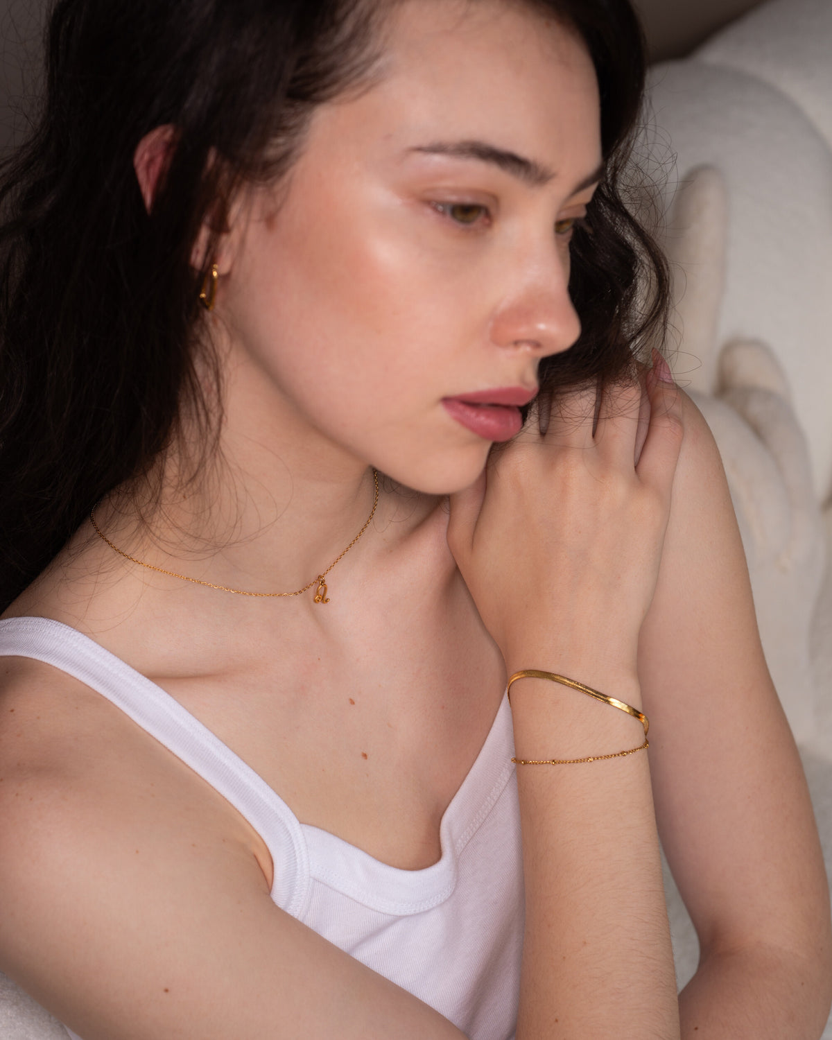 Lysa Bracelet, a skinny beaded 18K Gold PVD clasp bracelet.