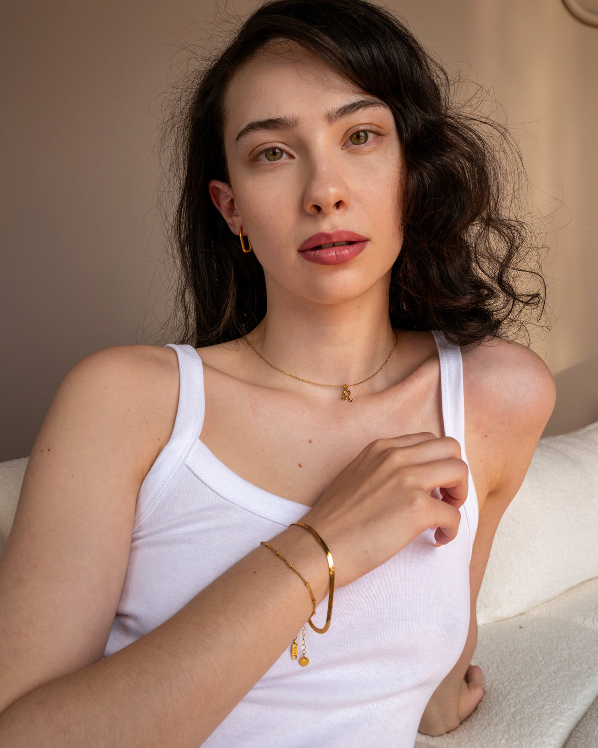 Lysa Bracelet, a skinny beaded 18K Gold PVD clasp bracelet.