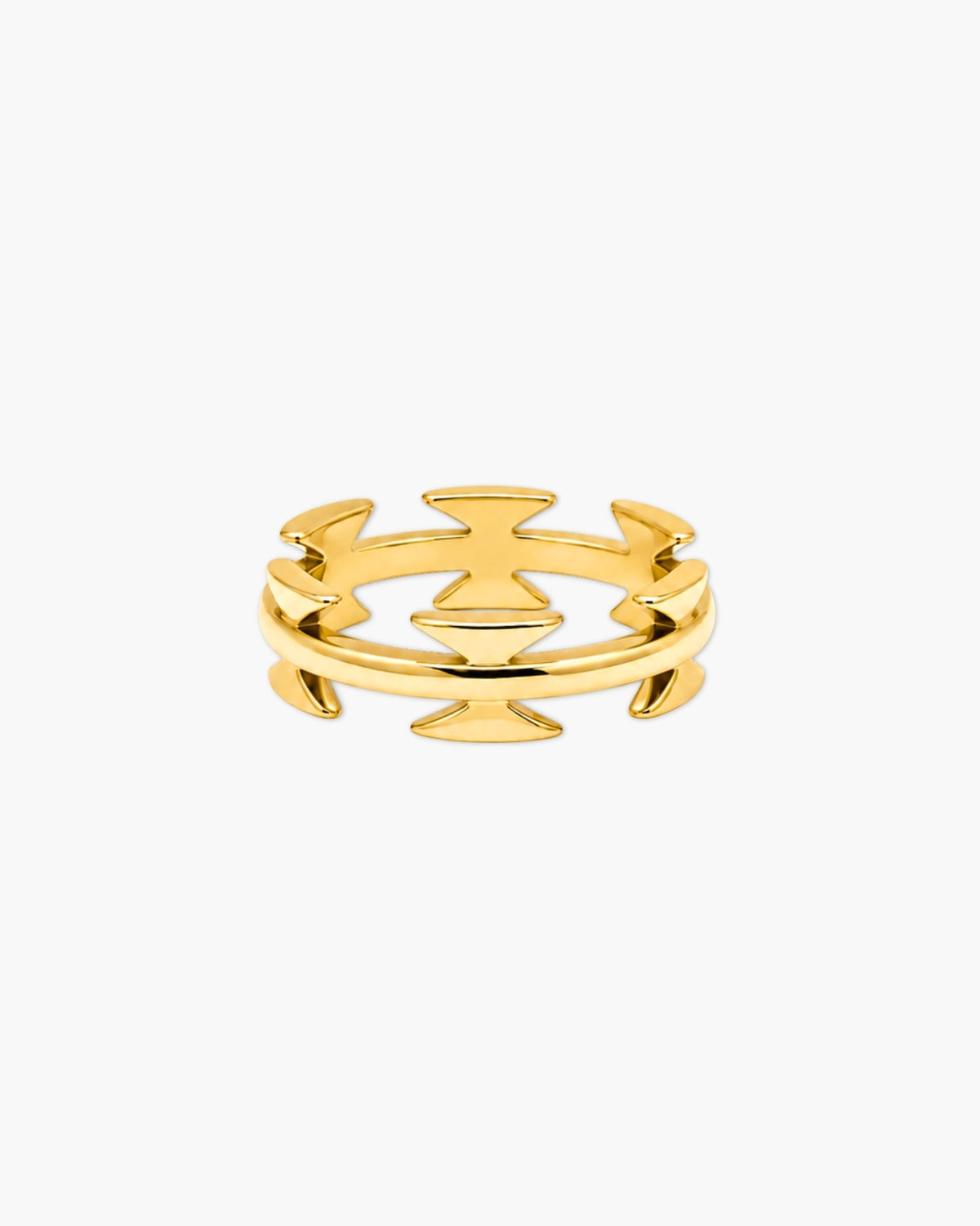 Polished gold-tone Nemesis ring with overlapping angular cutouts forming a bold zigzag geometric design on a white background.