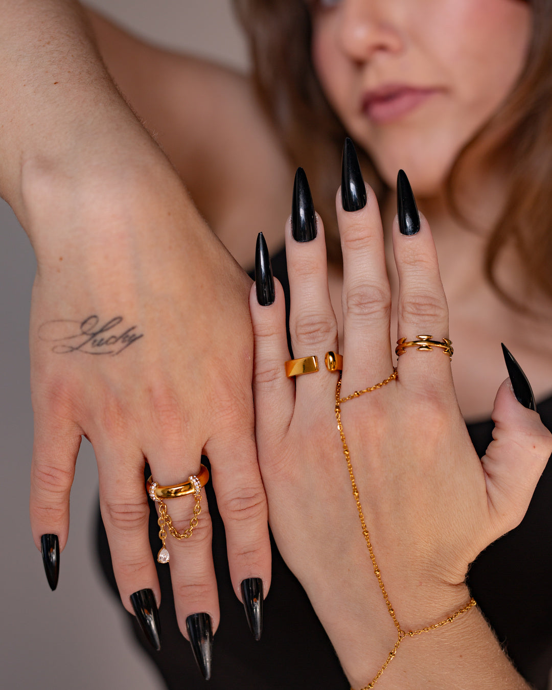 Nephele Hand Chain shown in a styled detail view.