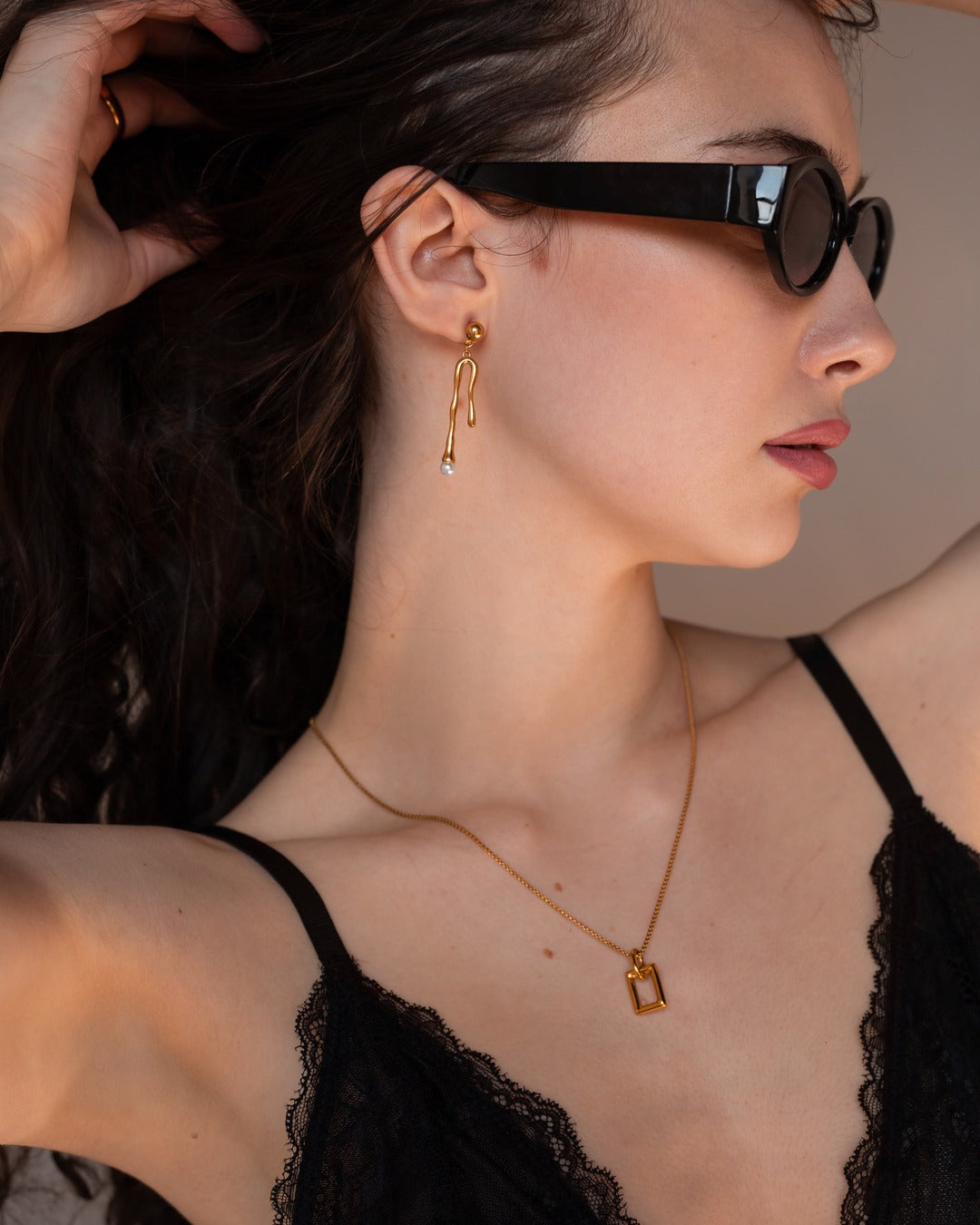 Zenobia Necklace worn in a side-profile lifestyle view.