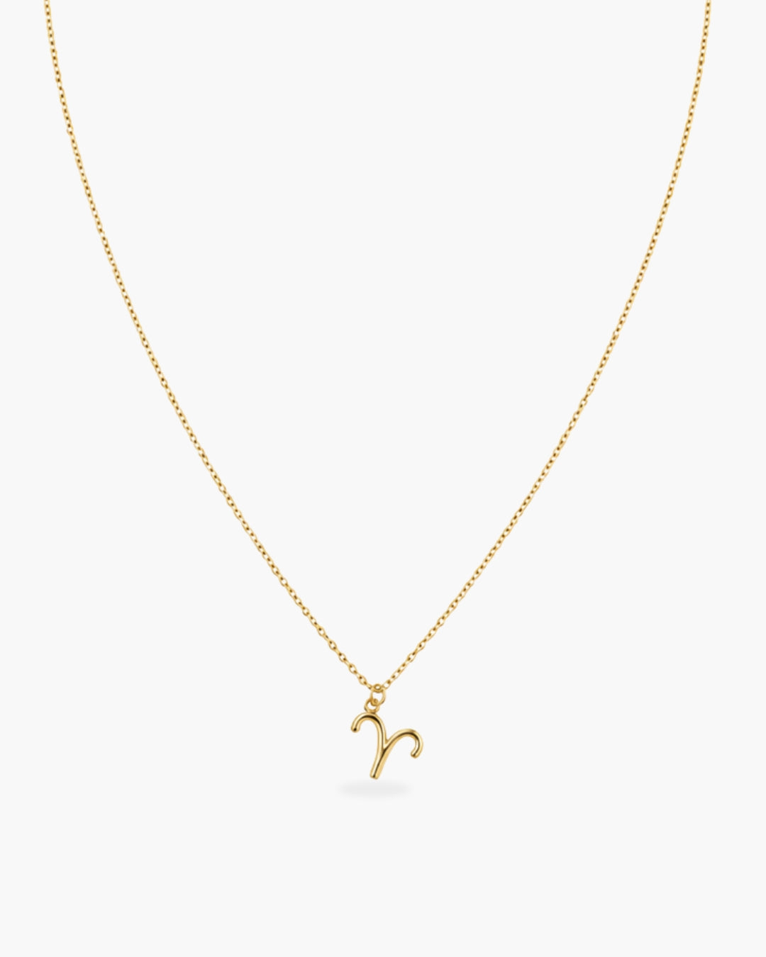 Gold-tone Aries zodiac pendant necklace on a fine adjustable chain.