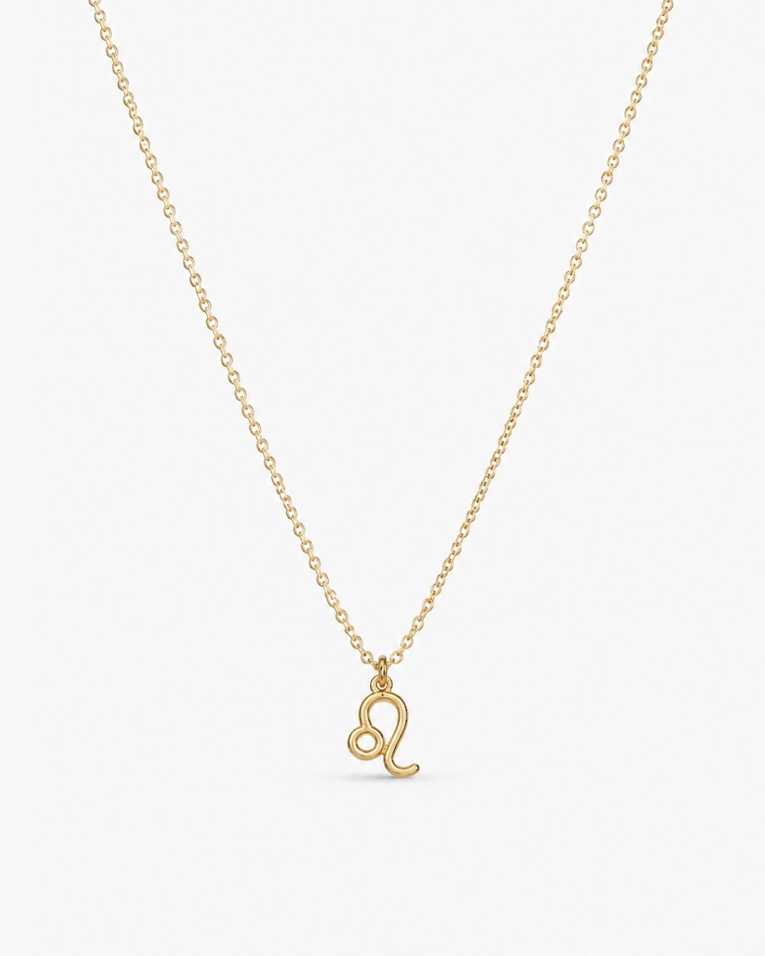 Gold-tone Leo zodiac pendant necklace on a fine adjustable chain.