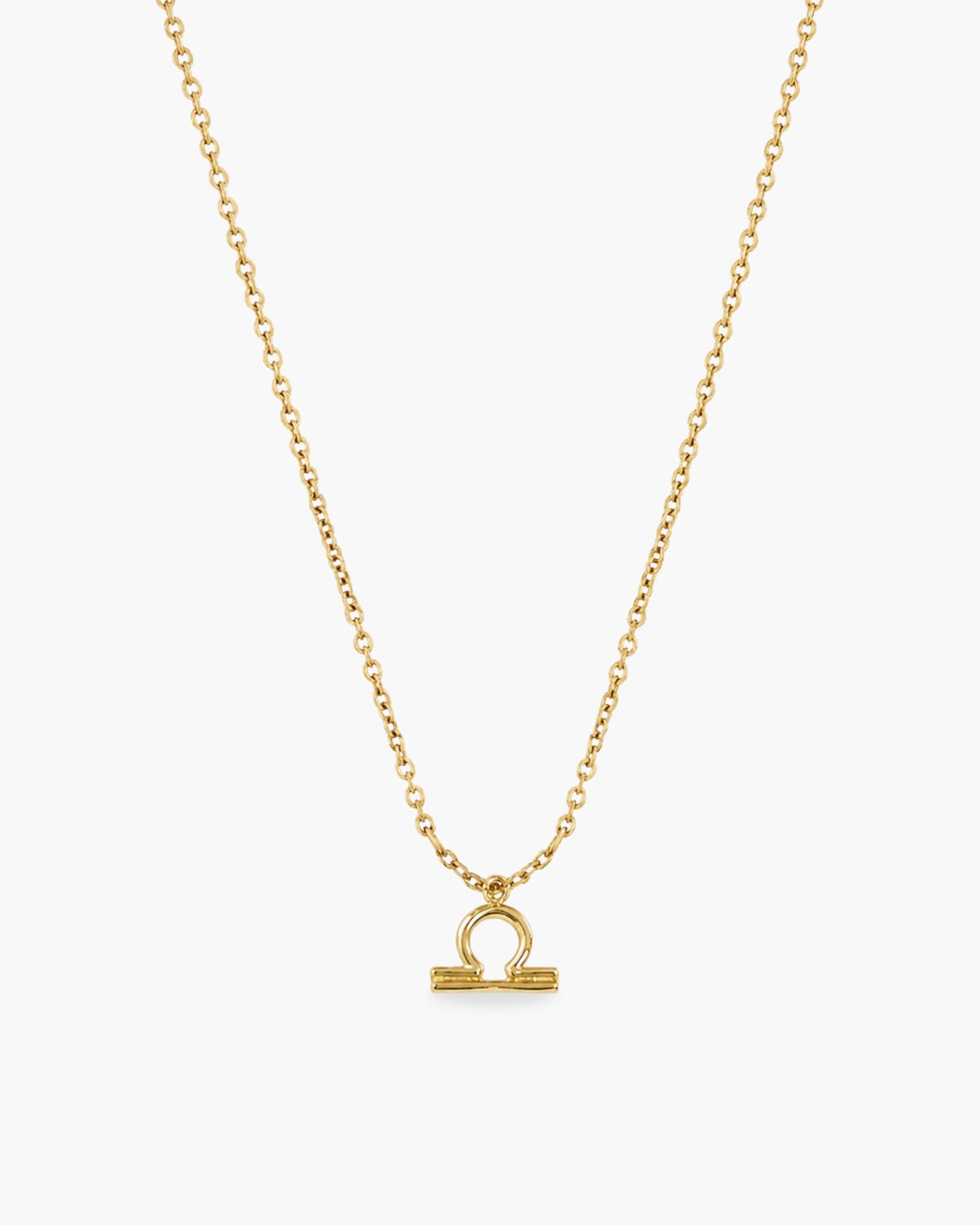 Gold-tone Libra zodiac pendant necklace on a fine adjustable chain.